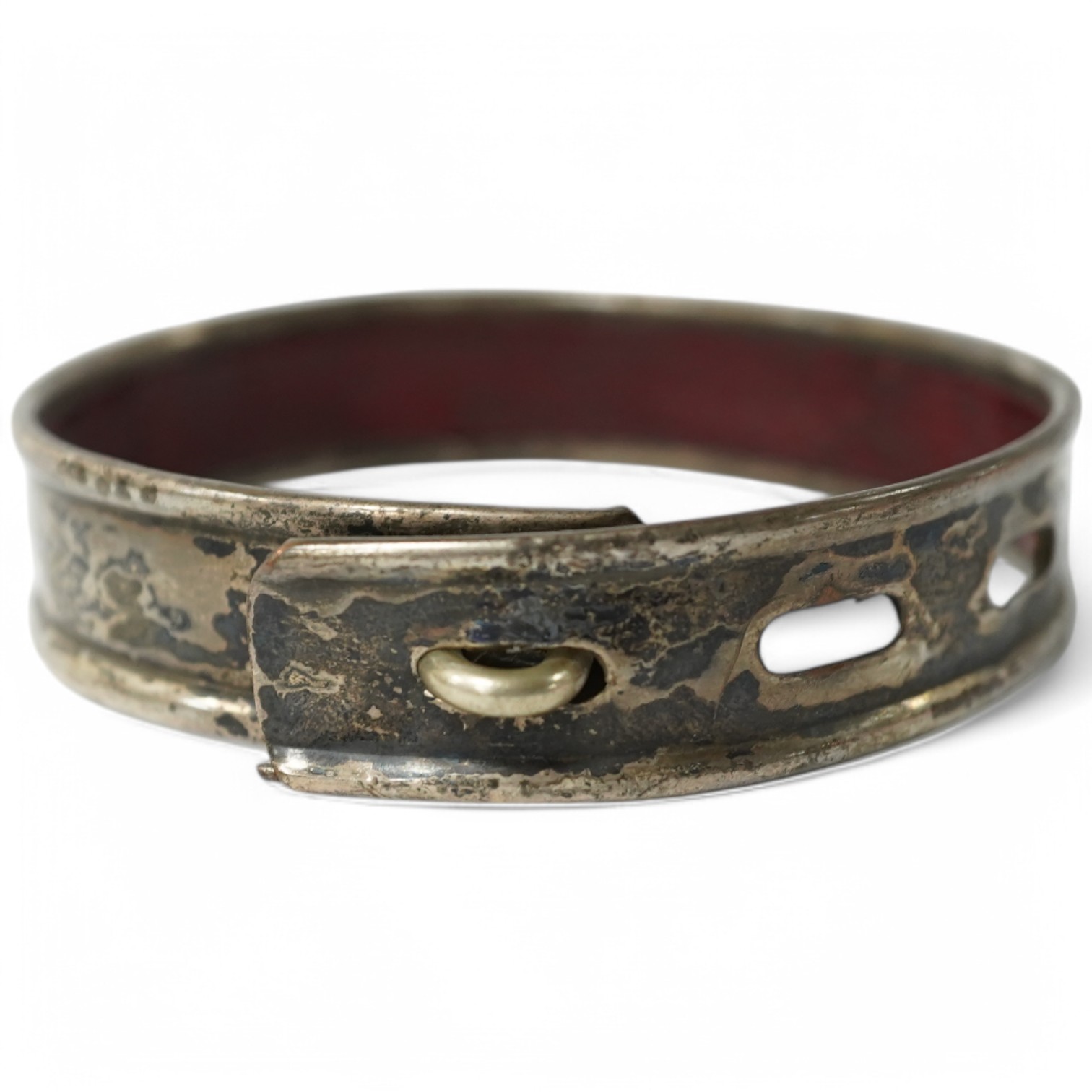 An 18th century Old Sheffield Plate and leather dog collar, 8.5cm in diameter. Condition - fair